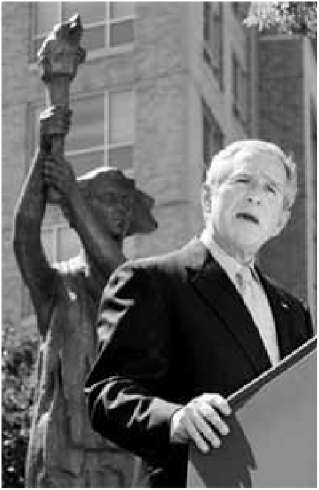 George W. Bush lying his teeth off at the opening of the "monument to the Victims of Communism"